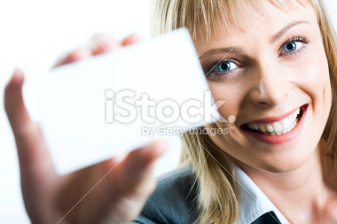 Young beautiful woman presenting her business card Click here to explore the whole lightbox: