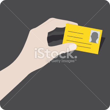 Hand holding a business card.