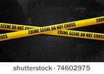 crime scene tape on black...