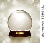 empty snowglobe against a...