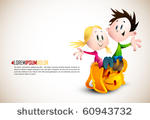 cute boy and girl sitting on...