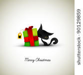 kitten fawns on gift box...