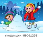 two kids throwing snow balls  ...