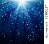 snow and stars are falling on...