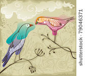 two beautiful  birds sitting on ...