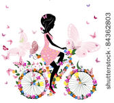 girl on a bicycle with a...