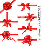 big set of red gift bows with...