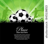 soccer players with ball on...
