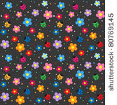 ladybugs and flowers on dark...