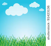 grassy green field and blue sky